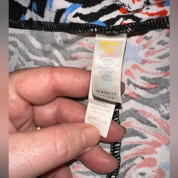2pair TC lularoe Americana Leggings. One floral flags, one fireworks. VGUC - Picture 6 of 11